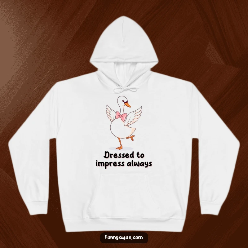 Funny Swan Hoodie: An elegant swan in a large bow tie gracefully does a playful pirouette, adding charm.
